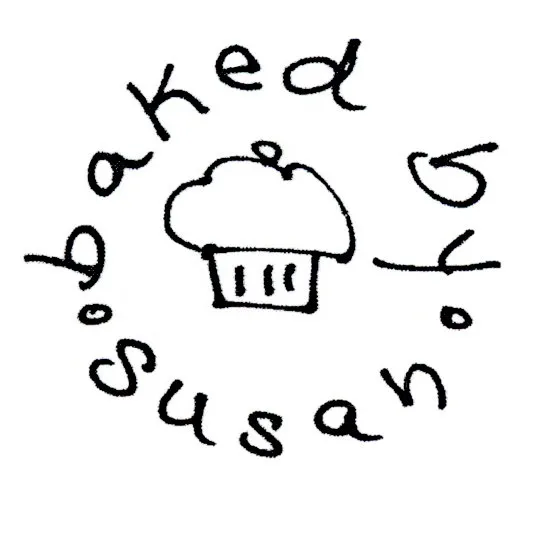 Baked by Susan's hand-drawn logo: a cupcake ringed by handwritten lettering, drawn with the same care as the baking.