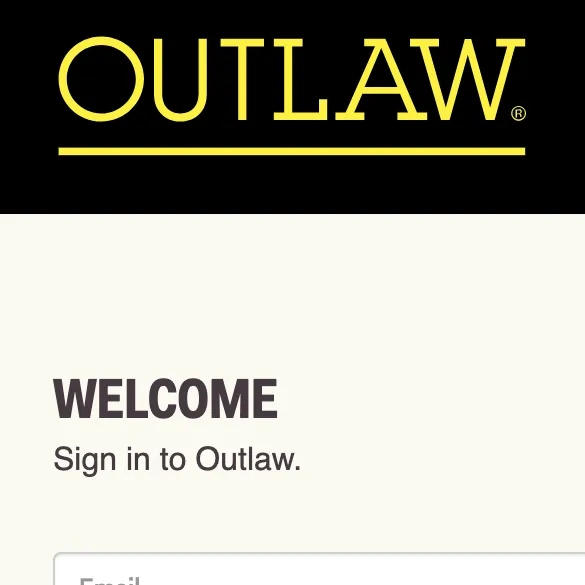 The OUTLAW sign-in screen: the name in yellow outlined capitals on black, above a cordial 'Welcome' — the politest outlaw you'll ever meet.